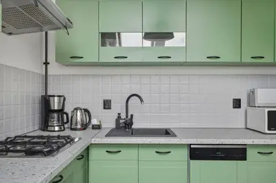 Kuchnia lub aneks kuchenny w obiekcie Kabacki Dukt 14 Loft Apartment by Solarento