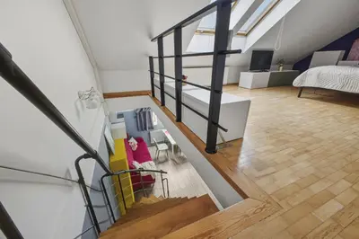 Łóżko lub łóżka w pokoju w obiekcie Kabacki Dukt 14 Loft Apartment by Solarento