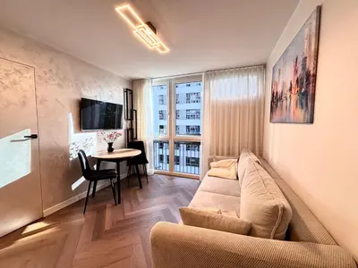 Telewizja i/lub zestaw kina domowego w obiekcie 409 Apartment