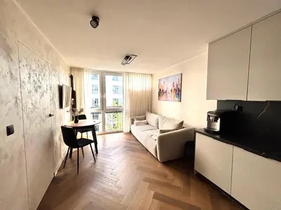 Łóżko lub łóżka w pokoju w obiekcie 409 Apartment