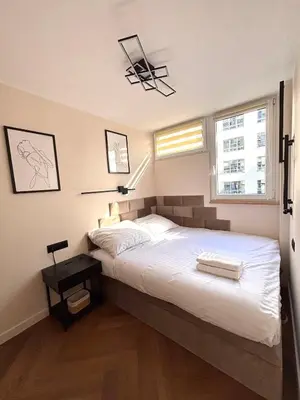 Łóżko lub łóżka w pokoju w obiekcie 409 Apartment