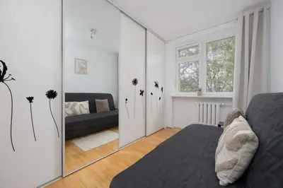 Część wypoczynkowa w obiekcie Spacious Air-conditioned Apartment with Balcony Close to PGE Narodowy by Noclegi Renters