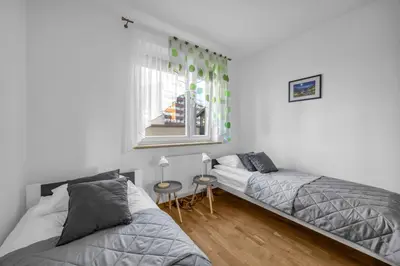 Łóżko lub łóżka w pokoju w obiekcie Grochów Apt - Terrace, Parking - By Rentujemy