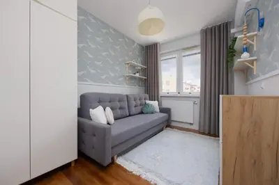 Część wypoczynkowa w obiekcie Warsaw Ursus Modern Apartment with Parking, AC & Balcony by Noclegi Renters