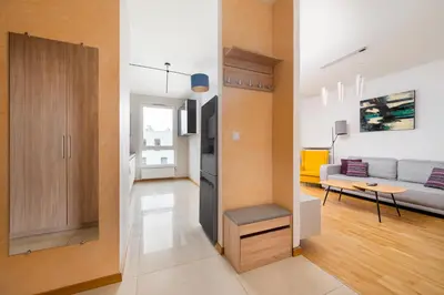 Telewizja i/lub zestaw kina domowego w obiekcie Kolska Superior Apartment by BookingHost