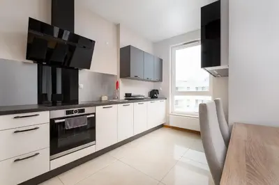 Kuchnia lub aneks kuchenny w obiekcie Kolska Superior Apartment by BookingHost