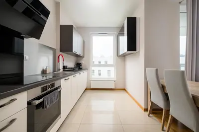 Kuchnia lub aneks kuchenny w obiekcie Kolska Superior Apartment by BookingHost
