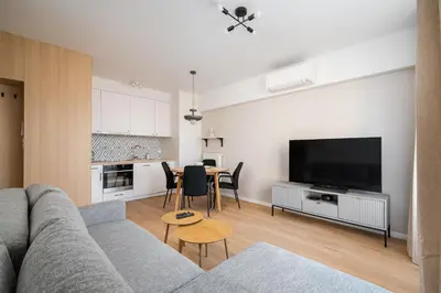 Telewizja i/lub zestaw kina domowego w obiekcie Racławicka 7 Superior Apartment by BookingHost