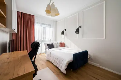 Łóżko lub łóżka w pokoju w obiekcie Metro Płocka 3-Bedroom Apartment by BookingHost