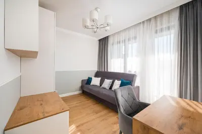 Część wypoczynkowa w obiekcie Metro Płocka 3-Bedroom Apartment by BookingHost