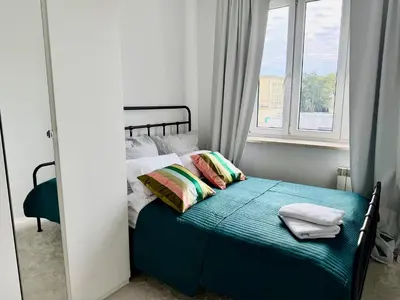 Łóżko lub łóżka w pokoju w obiekcie OhMyHome Stara Ochota