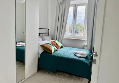 Łóżko lub łóżka w pokoju w obiekcie OhMyHome Stara Ochota