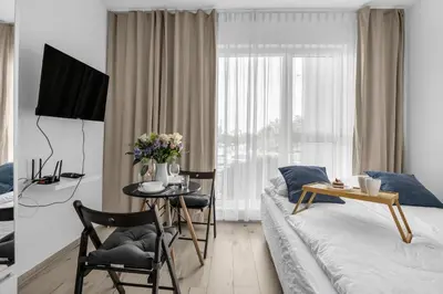 Łóżko lub łóżka w pokoju w obiekcie Warsaw Wola Studio - Top Location - by Rentujemy