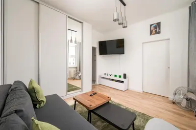 Telewizja i/lub zestaw kina domowego w obiekcie Marszałkowska City Centre Apartment by BookingHost