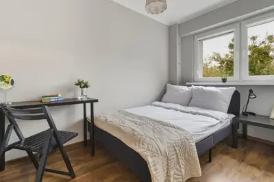 Łóżko lub łóżka w pokoju w obiekcie Wrzeciono 35 Urban Apartment by Solarento