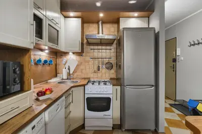 Kuchnia lub aneks kuchenny w obiekcie Wrzeciono 35 Urban Apartment by Solarento