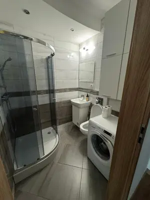 Łazienka w obiekcie Komfortowy Dwupoziomowy Apartament