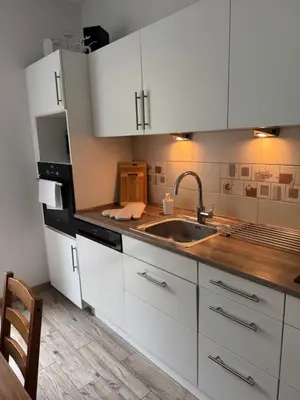 Kuchnia lub aneks kuchenny w obiekcie Komfortowy Dwupoziomowy Apartament