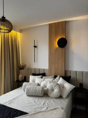 Łóżko lub łóżka w pokoju w obiekcie Family & Business Apartments PREMIUM No1 - 1 Bedroom with Private Jacuzzi, Balcony, Parking