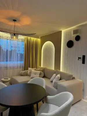 Część wypoczynkowa w obiekcie Family & Business Apartments PREMIUM No 2 - 1 Bedroom with Private Jacuzzi, Balcony, Parking