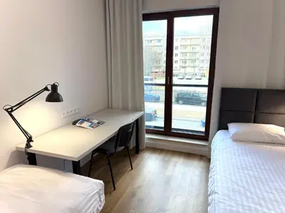 Łóżko lub łóżka w pokoju w obiekcie Comfort Studios Mokotów