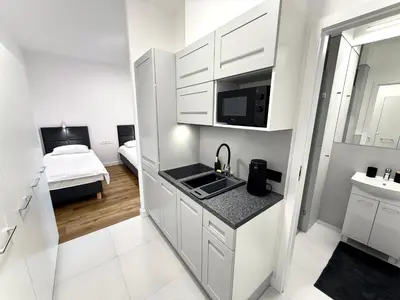 Kuchnia lub aneks kuchenny w obiekcie Comfort Studios Mokotów