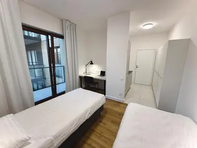 Łóżko lub łóżka w pokoju w obiekcie Comfort Studios Mokotów