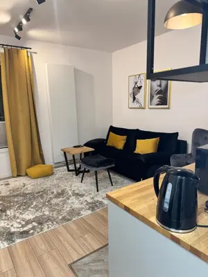 Część wypoczynkowa w obiekcie Golden Apartment