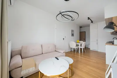 Część wypoczynkowa w obiekcie Jerozolimskie Modern Apartment by BookingHost