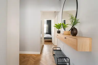 Łóżko lub łóżka w pokoju w obiekcie Metro Ursynów Superior Apartment by BookingHost