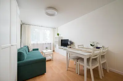 Telewizja i/lub zestaw kina domowego w obiekcie Olszowa 8 Harmony Apartment by BookingHost
