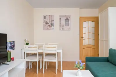 Telewizja i/lub zestaw kina domowego w obiekcie Olszowa 8 Harmony Apartment by BookingHost