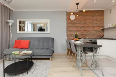 Część wypoczynkowa w obiekcie Charming Studio in Warsaw Center with Air Conditioning by Noclegi Renters