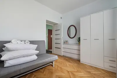 Łóżko lub łóżka w pokoju w obiekcie Promenada 13 Classic Apartment by Solarento