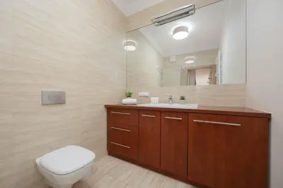 Łazienka w obiekcie Family Apartment with 2 Bedrooms on the 16th Floor in Warsaw by Noclegi Renters