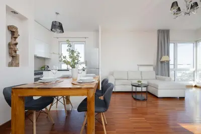 Część wypoczynkowa w obiekcie Family Apartment with 2 Bedrooms on the 16th Floor in Warsaw by Noclegi Renters