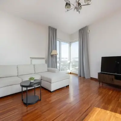 Family Apartment with 2 Bedrooms on the 16th Floor in Warsaw by Noclegi Renters
