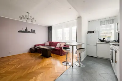 Kuchnia lub aneks kuchenny w obiekcie Warszawa Wola Homely Apartment by BookingHost