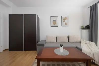 Część wypoczynkowa w obiekcie Bright Apartment in Muranów Close to the Old Town by Noclegi Renters