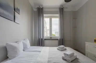 Łóżko lub łóżka w pokoju w obiekcie Urban Chic - Comfortable 2-Bedroom in City Center, Marszałkowska