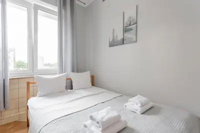 Łóżko lub łóżka w pokoju w obiekcie Urban Chic - Comfortable 2-Bedroom in City Center, Marszałkowska