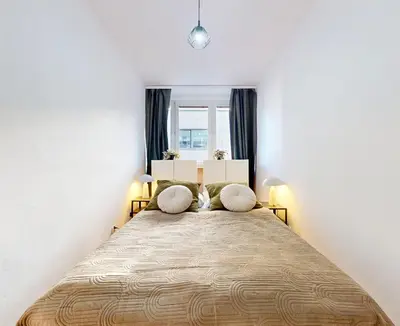 Łóżko lub łóżka w pokoju w obiekcie Mirabelle Apartment Metro Wierzbno Mokotow