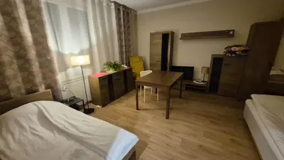 Łóżko lub łóżka w pokoju w obiekcie Przytulne studio przy Metro Płocka l Cozy studio near the Płocka Metro Station