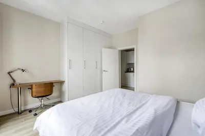 Łóżko lub łóżka w pokoju w obiekcie Moko RAR Apartments
