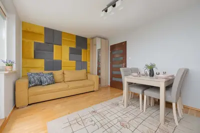 Część wypoczynkowa w obiekcie Comfortable Apartment with Air Conditioning and Balcony in the Capital by Noclegi Renters