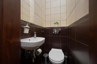 Łazienka w obiekcie Comfortable Apartment with Air Conditioning and Balcony in the Capital by Noclegi Renters