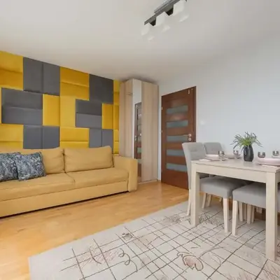 Comfortable Apartment with Air Conditioning and Balcony in the Capital by Noclegi Renters