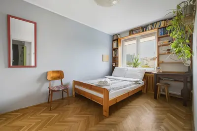 Łóżko lub łóżka w pokoju w obiekcie Karmelicka 19 Green View Apartment by Solarento