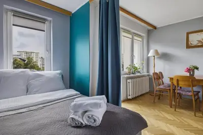 Łóżko lub łóżka w pokoju w obiekcie Karmelicka 19 Green View Apartment by Solarento