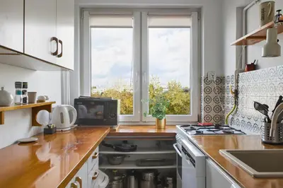 Kuchnia lub aneks kuchenny w obiekcie Karmelicka 19 Green View Apartment by Solarento